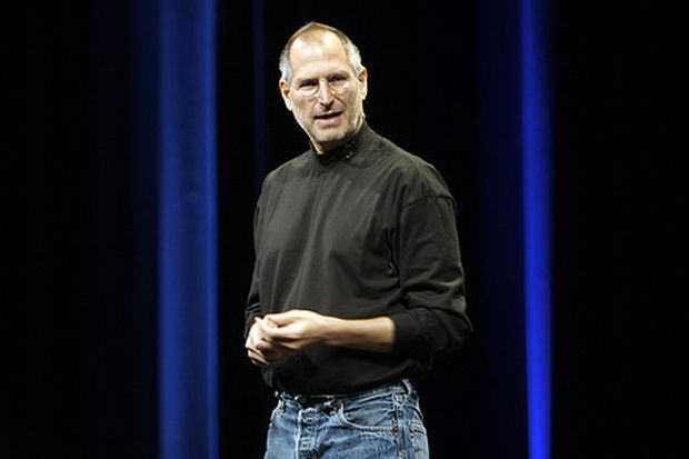 Steve Jobs, making a presentation in his usual clothes: black turtle-neck knit and jeans.