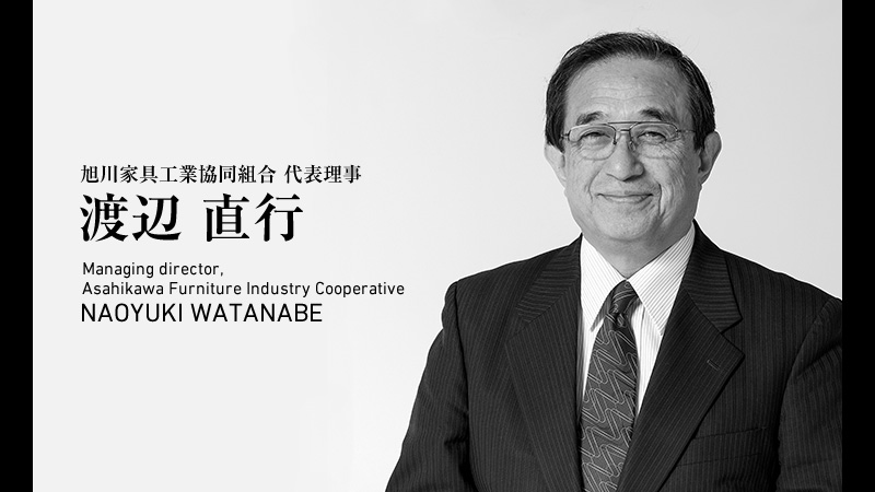 This is the image of his business card. The text says he is also the managing director of Asahikawa Furniture Industry Cooperation.