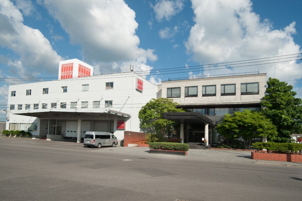 The building of CondeHouse headquarters under the blue sky.