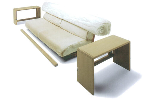 A sofa disassembled into parts like inner-cushions, frames, etc.