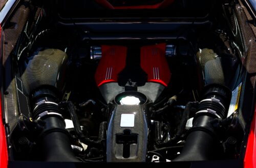 The engine room of a red Ferrari