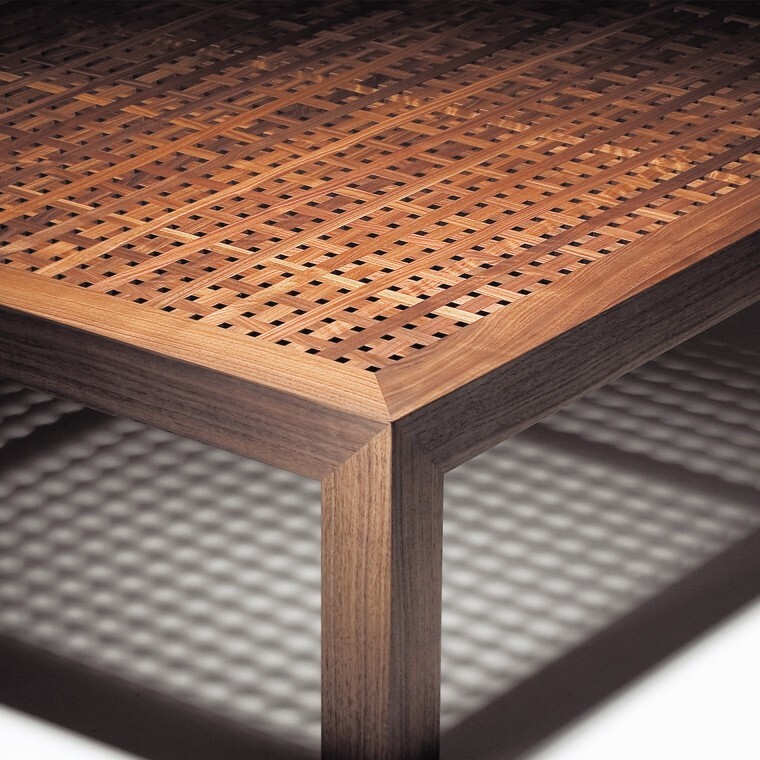One of our coffee tables. The tabletop is grid-style, and the light penetrating the table top creates the same-shape shadow on the floor.