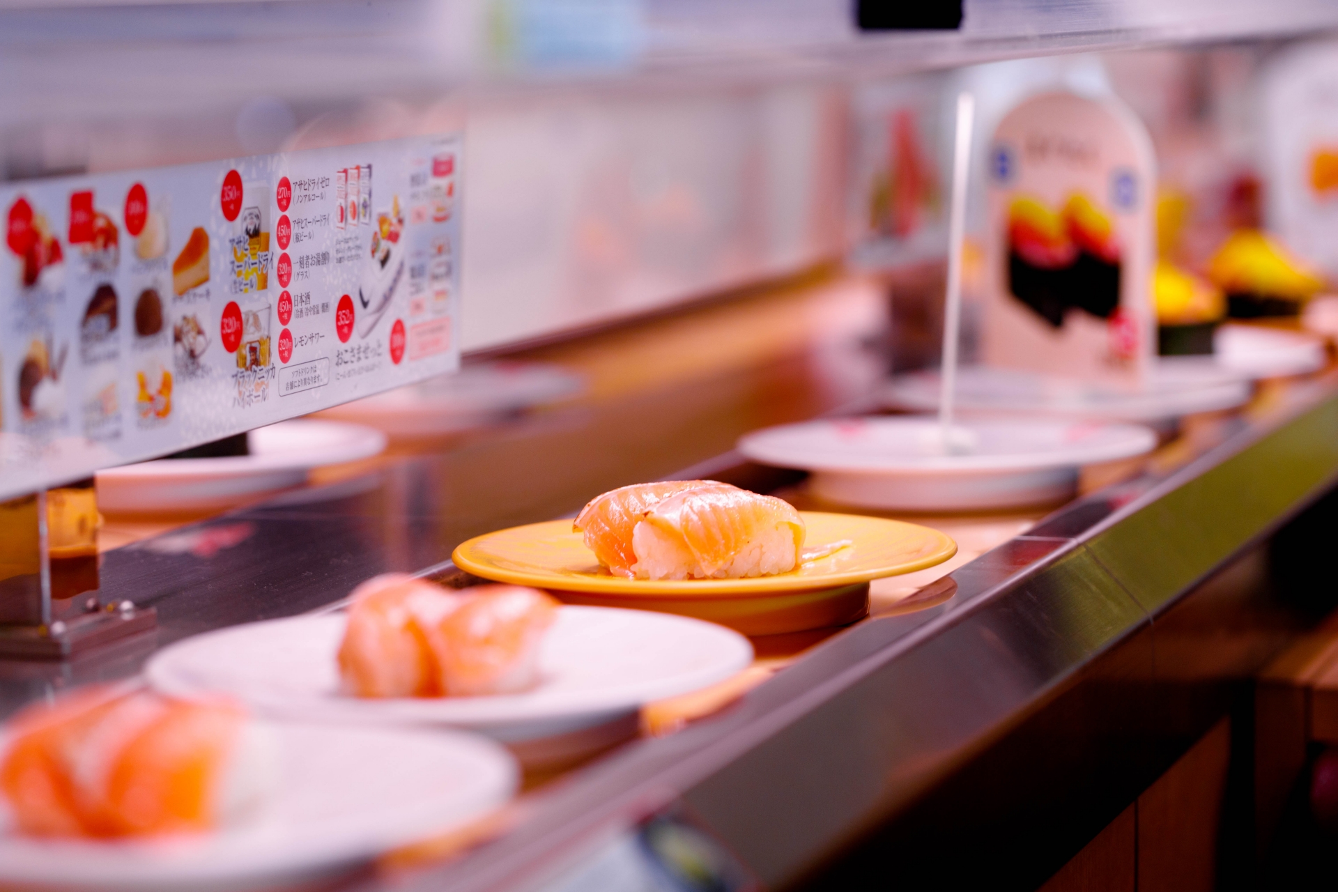 Sushi dishes rotating on a conveyor-belt