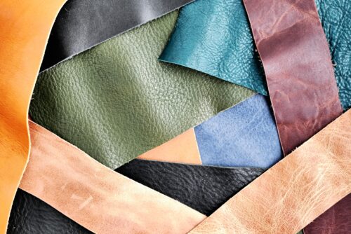 Colorful pieces of leather are placed.