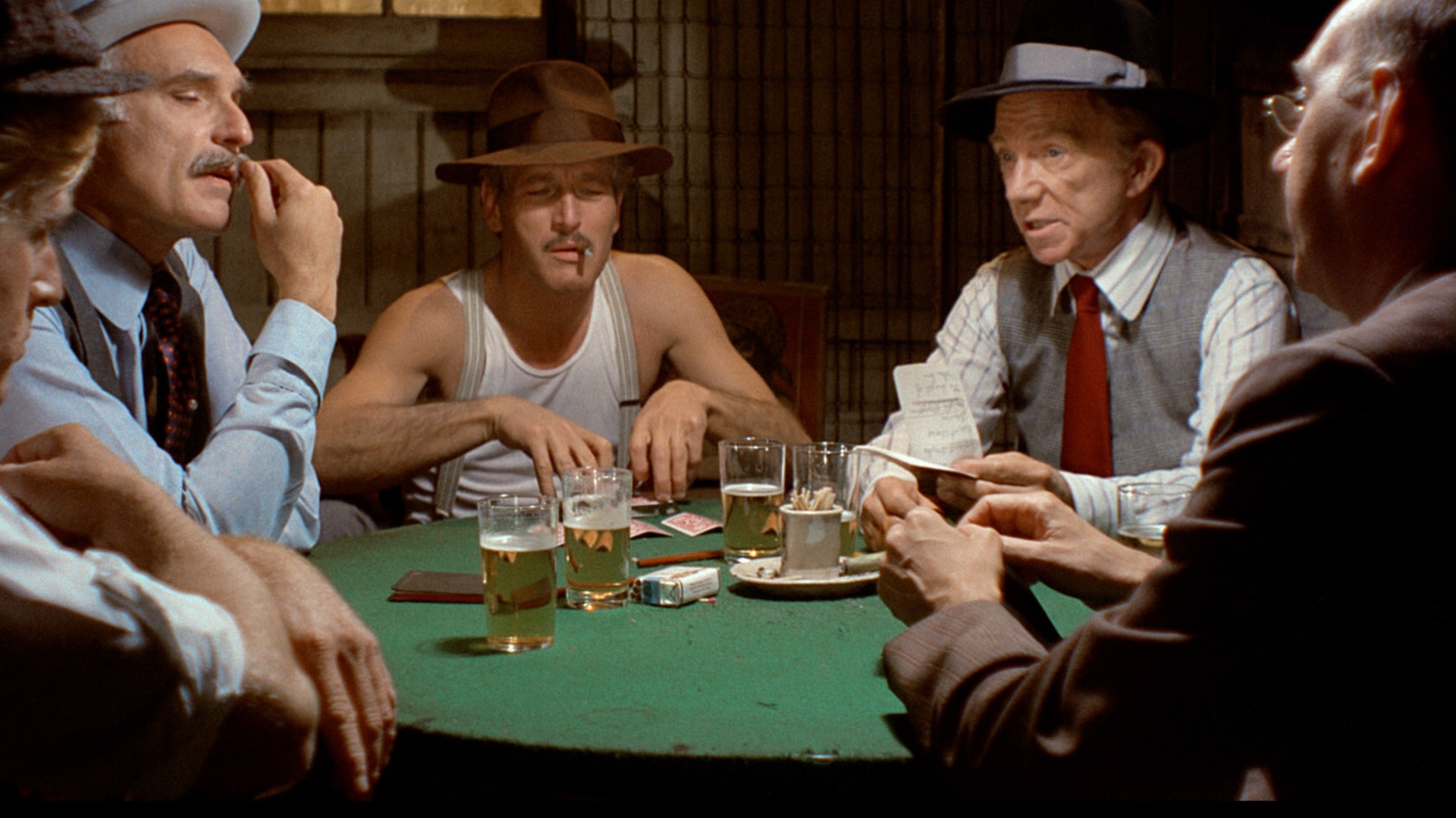 A scene of the movie "Sting" where some people are playing a card game