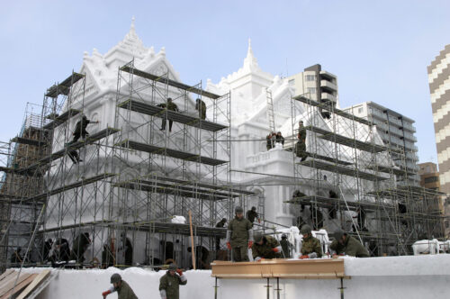 The snow sculpture under construction by JSDF staff