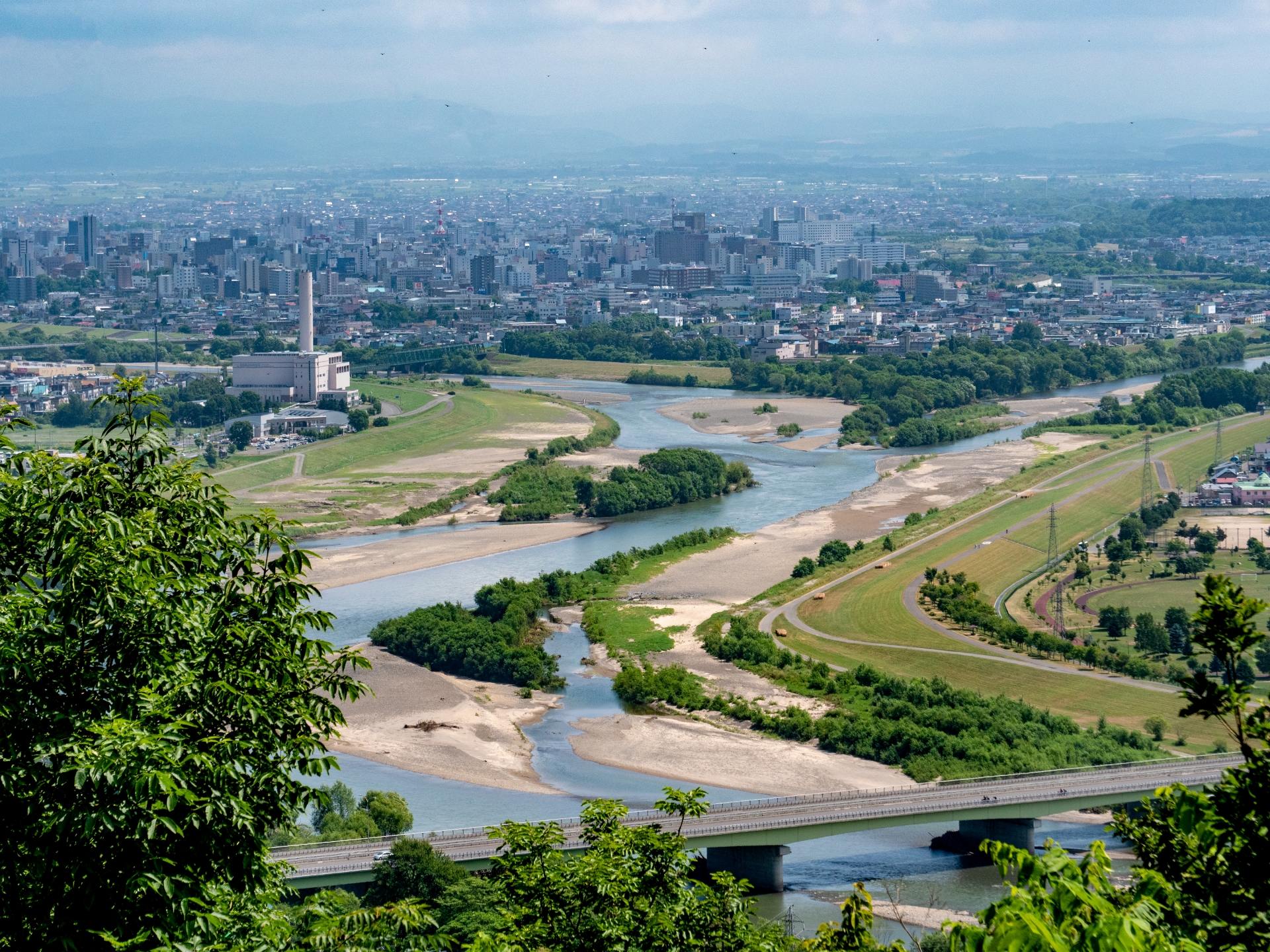 The whole view of Asahikawa city seen from the view spot of the near mountain