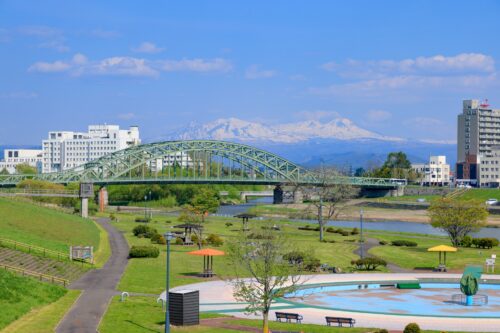 Asahibashi bridge with Taisetsuzan mountains in its background