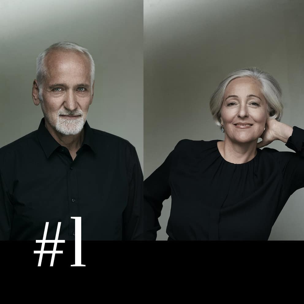 The portrait of a German designer team. Both of them are wearing a black shirt. They designed a dining chair for CondeHouse.