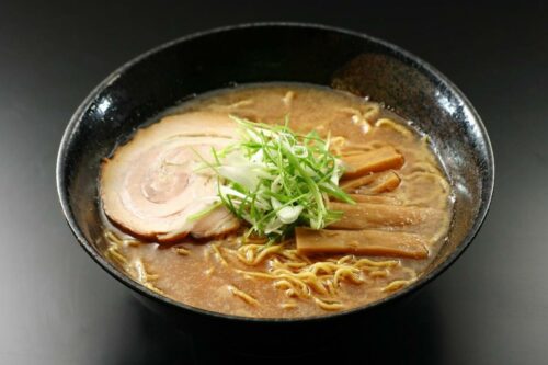 Asahikawa ramen noodle with grilled pork meat and bamboo shoots on the top.