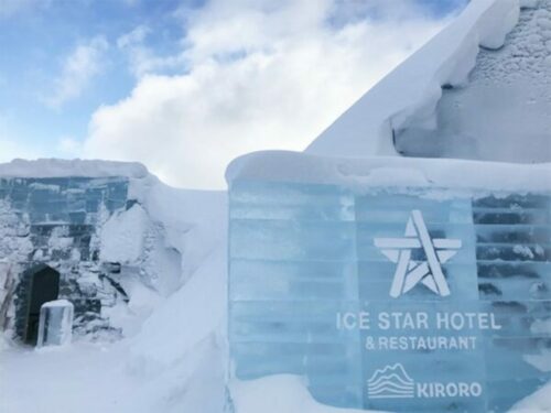 The entrance of an igloo hotel made of ice
