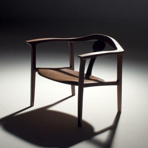 A wooden lounge chair designed by Masayuki Nagare.